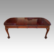 Edwardian mahogany claw and ball extending table