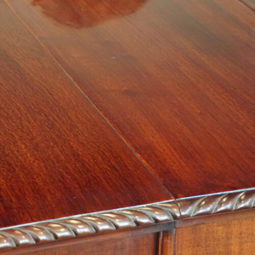 Edwardian mahogany claw and ball extending table carved edge