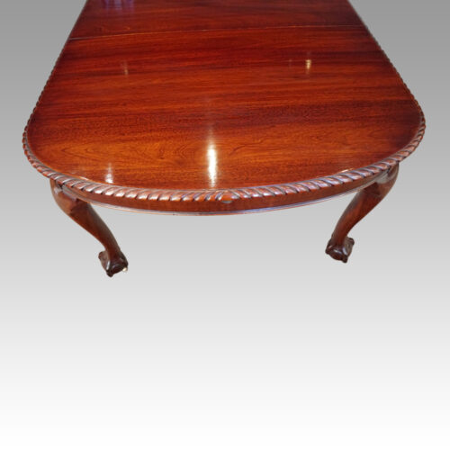 Edwardian mahogany claw and ball extending table end