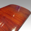 Edwardian mahogany claw and ball extending table top detail