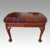 Edwardian mahogany claw and ball extending table without leaves