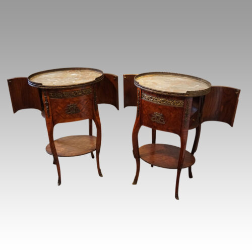 Pair of Parquetry oval cabinets doors open