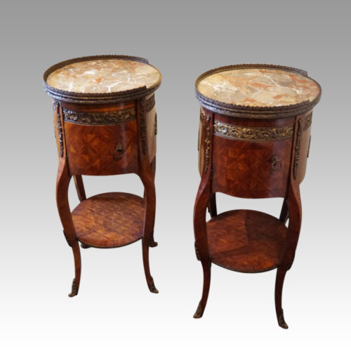 Pair of Parquetry oval cabinets side view