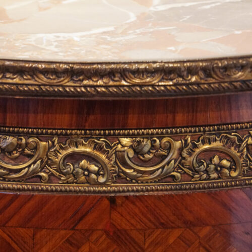 Pair of Parquetry oval cabinets top moulding
