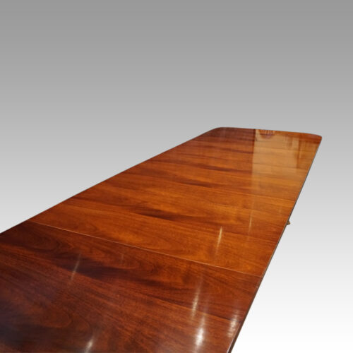 Regency style mahogany 3 pillar dining table length view