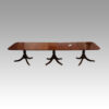Regency style mahogany 3 pillar dining table side view
