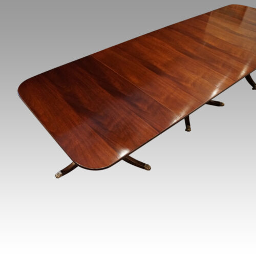Regency style mahogany 3 pillar dining table top view