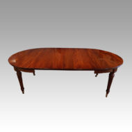 Edwardian mahogany circular extending dining table