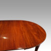 Edwardian mahogany circular extending dining table end view top