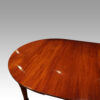 Edwardian mahogany circular extending dining table top end detail