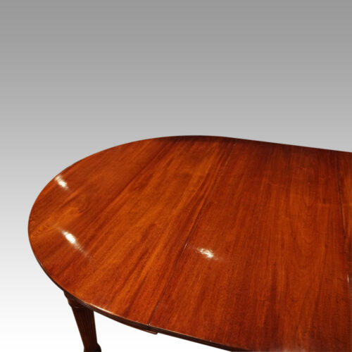 Edwardian mahogany circular extending dining table top end detail