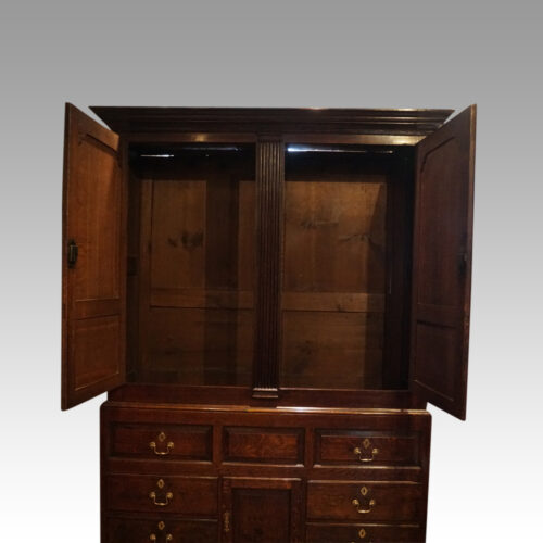 George III oak livery cupboard interior