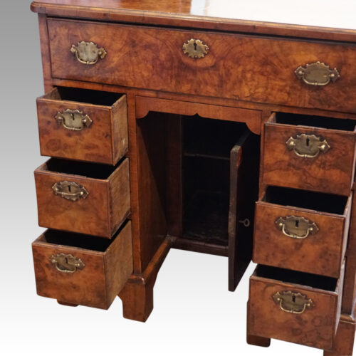 George III walnut knee hole drawers open