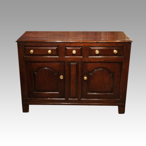 Georgian oak dresser base detail