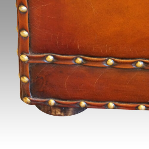 Large leather ottoman bottom corner