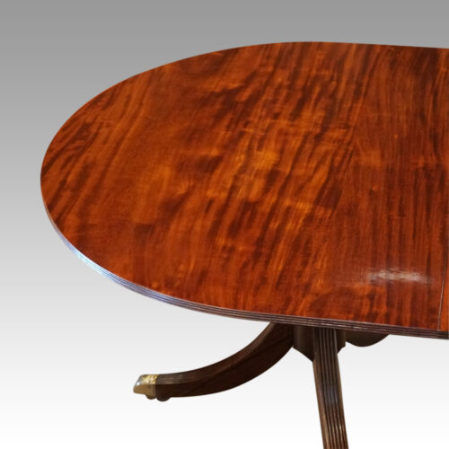 Regency style mahogany twin pillar table end
