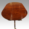 Regency style mahogany twin pillar table end long view