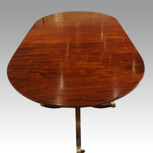 Regency style mahogany twin pillar table end long view