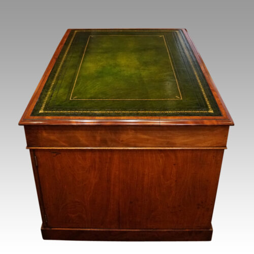 Antique mahogany partners desk side view