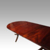 George V mahogany 3 pillar dining table round end