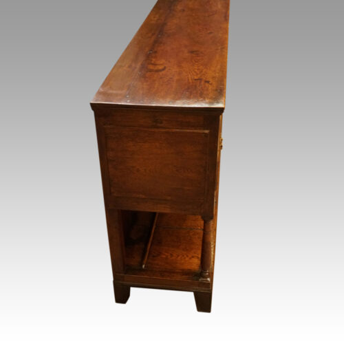 Antique oak dresser base side