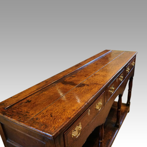 Georgian oak inlaid dresser base top end detail
