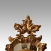 Gilt cartouche shaped mirror top