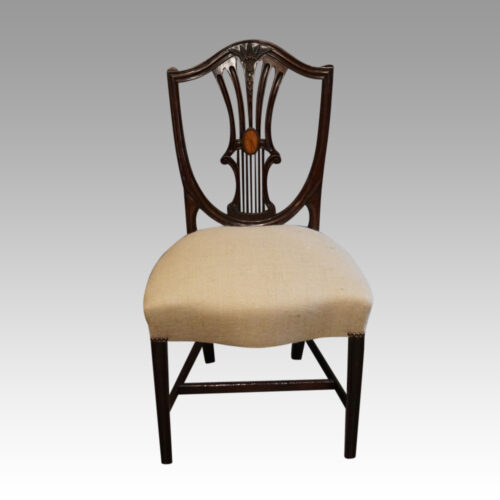 Harlequin set of 14 dining chairs inlaid back