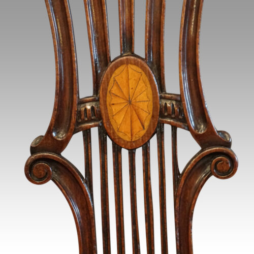 Harlequin set of 14 dining chairs inlaid central splat