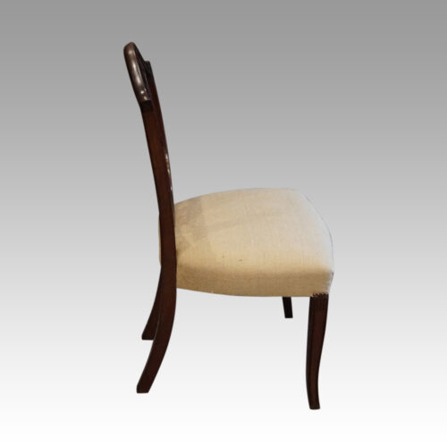 Harlequin set of 14 dining chairs side inlaid