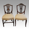 Harlequin set of 14 dining chairs ying and yang