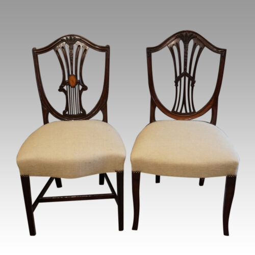 Harlequin set of 14 dining chairs ying and yang