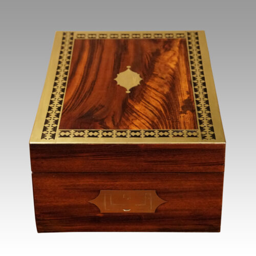 Antique mahogany cut brass box end