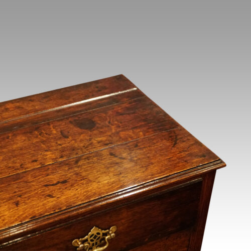 Antique oak arched dresser corner detail