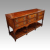 Antique oak dresser base at angle