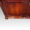 Edwardian mahogany library bookcaseby Warings of Liverpool cupboard door