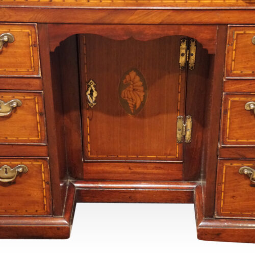 George III inlaid kneehole central cupboard