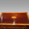 George III inlaid kneehole top detail
