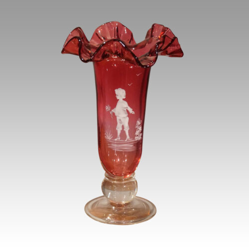 Pair of Mary Gregory fluted cranberry vases boy