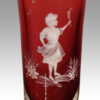Pair of Mary Gregory fluted cranberry vases girl detail