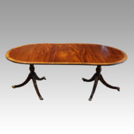 Regency style mahogany deep banded dining table