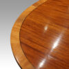 Regency style mahogany deep banded dining table banding