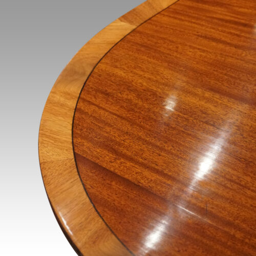Regency style mahogany deep banded dining table banding