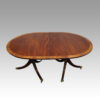 Regency style mahogany deep banded dining table closed