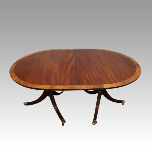 Regency style mahogany deep banded dining table closed