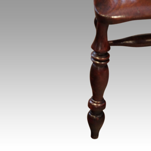 Antique Yorkshire broad arm chair front leg