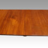 George V mahogany twin pillar dining table centre leaves