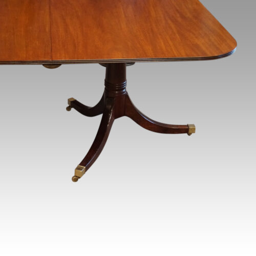 George V mahogany twin pillar dining table end