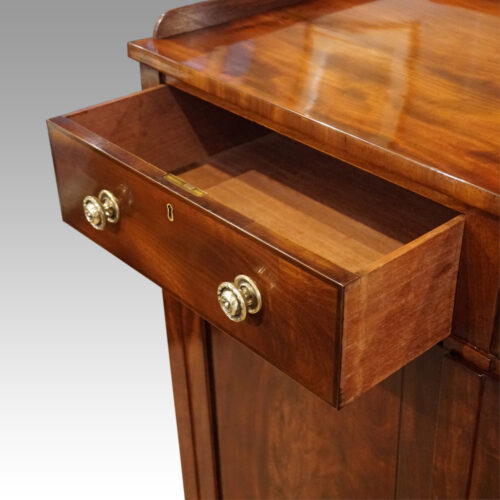 Georgian mahogany low linen press drawer open