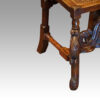 Pair Carolean style oak chairs front leg